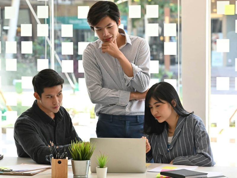 startup concept team of young business analysis data in laptop computer